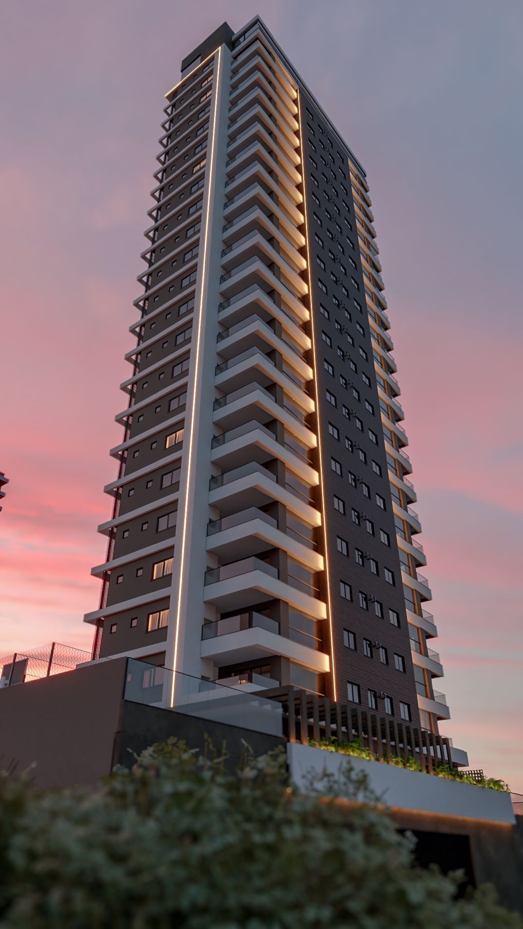 Torre do Alipio Schirmann ao entardecer, com a faixa de LED na fachada